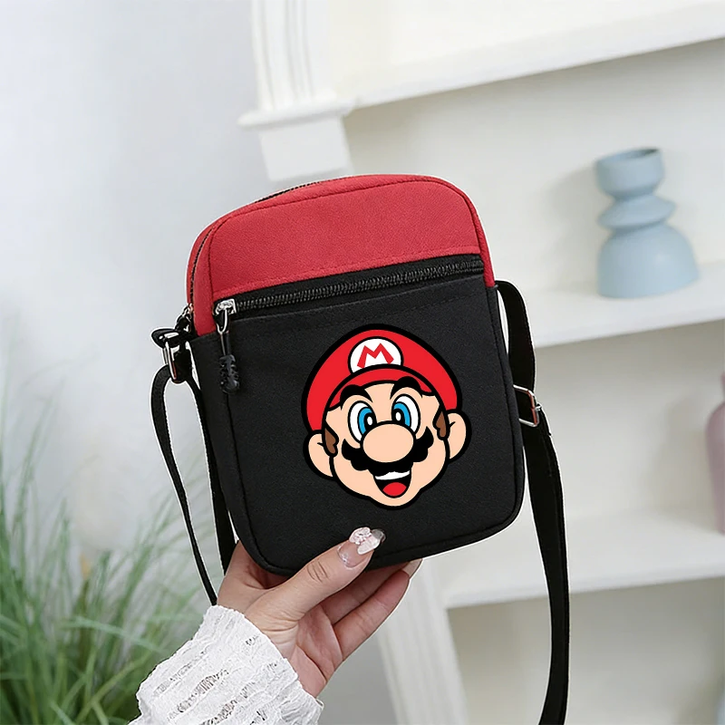 Сумка через плечо Super Marios Bro для мальчиков и девочек, с мультяшными буквами, регулируемая, с несколькими отделениями, сумка для мобильного телефона, повседневная сумка через плечо
Сумка через плечо Super Marios Bro для мальчиков и девочек, с мультяшными буквами, регулируемая, с несколькими отделениями, сумка для мобильного телефона, повседневная сумка через плечо