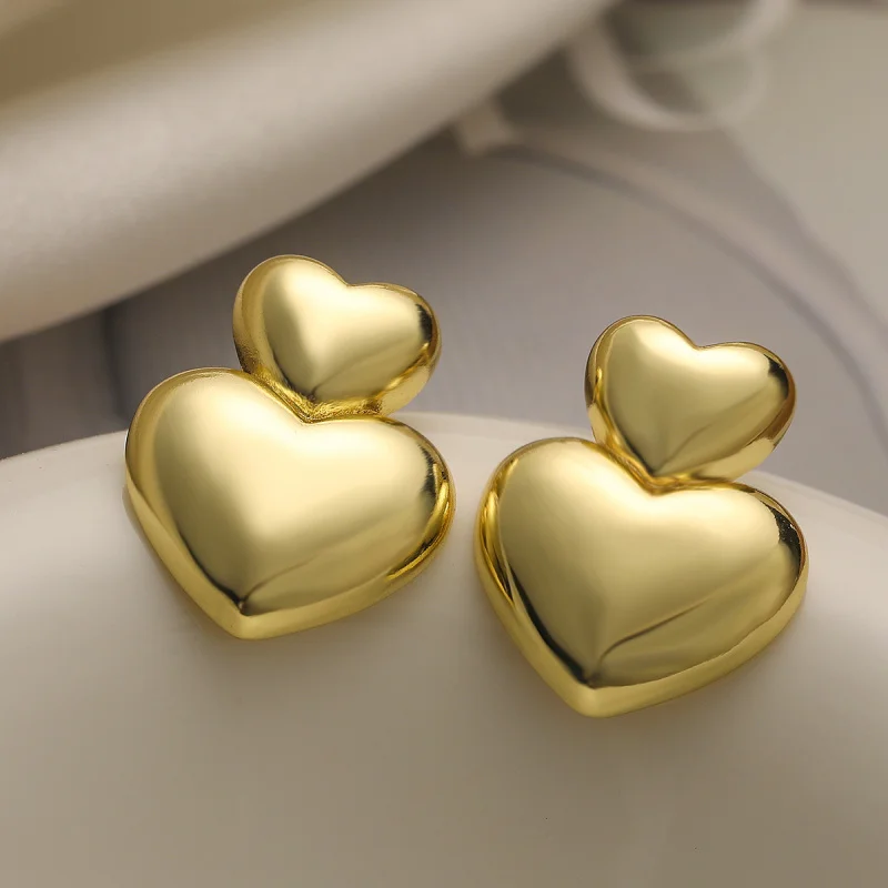 European and American Metal Style Copper Plated 18K Gold Smooth Heart Earrings for Women Simple Elegant Versatile Earrings New
European and American Metal Style Copper Plated 18K Gold Smooth Heart Earrings for Women Simple Elegant Versatile Earrings New