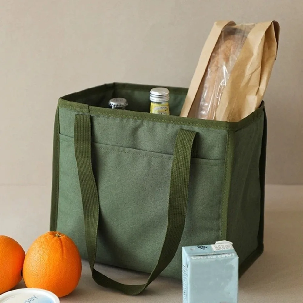Портативная изолированная сумка для обеда большой емкости, ручная водонепроницаемая сумка для покупок, однотонная износостойкая сумка для подгузников
Портативная изолированная сумка для обеда большой емкости, ручная водонепроницаемая сумка для покупок, однотонная износостойкая сумка для подгузников