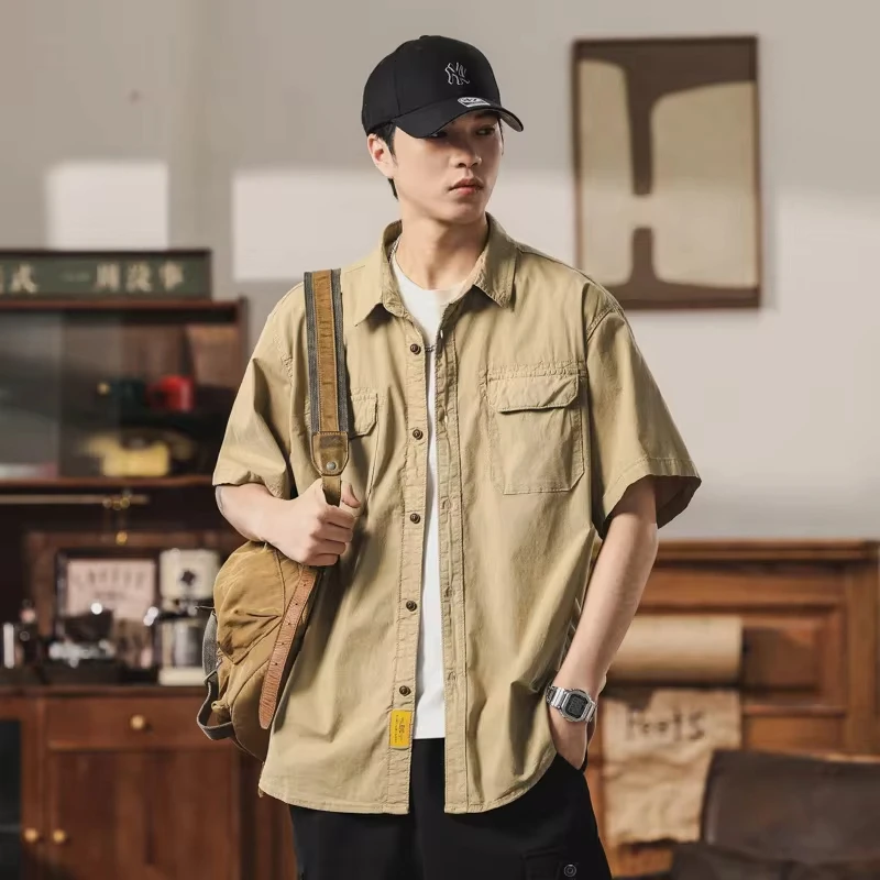 2025 New Fashion Japanese Style Men's Solid Color Multi Pocket Casual Trendy Loose Short Sleeve Shirts Male Summer Clothes Tops
2025 New Fashion Japanese Style Men's Solid Color Multi Pocket Casual Trendy Loose Short Sleeve Shirts Male Summer Clothes Tops