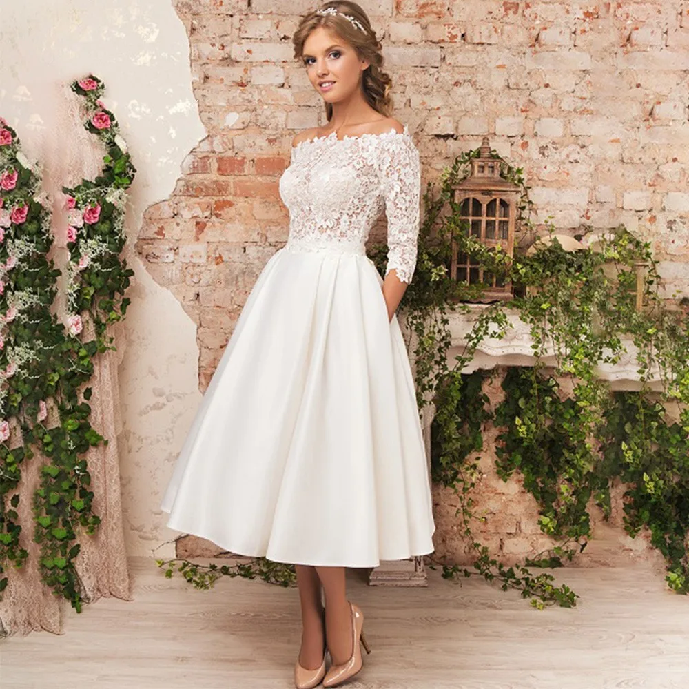 Vintage Lace Short Wedding Dresses A Line Off Shoulder Long Sleeves Satin Skirt A Line Tea Length Bridal Gowns 2023 For Women
Vintage Lace Short Wedding Dresses A Line Off Shoulder Long Sleeves Satin Skirt A Line Tea Length Bridal Gowns 2023 For Women