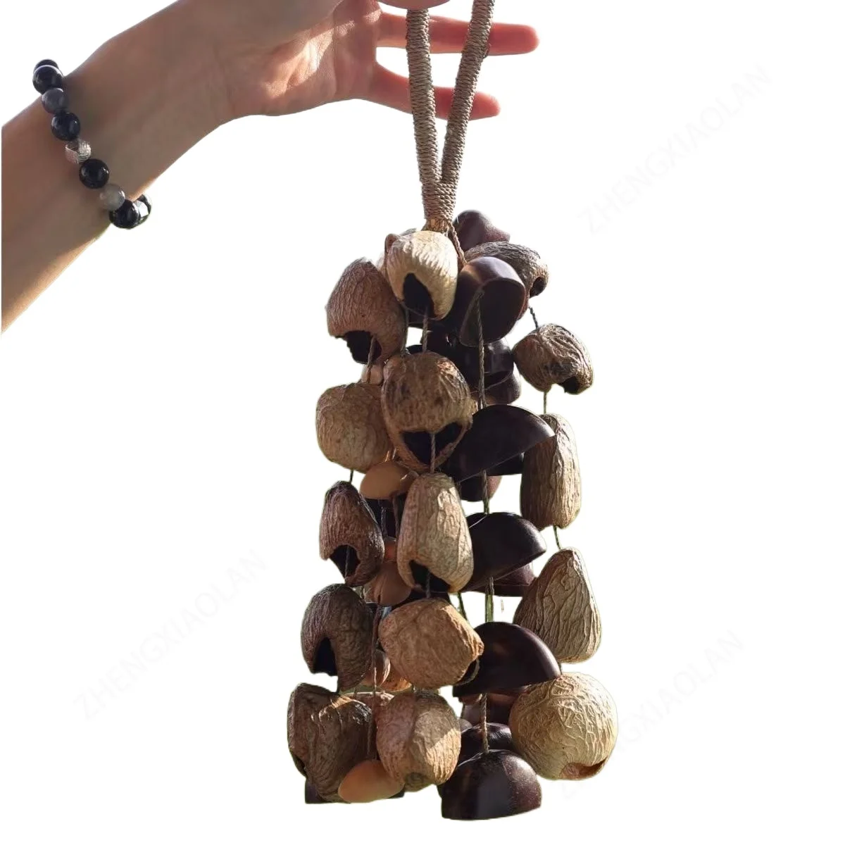 Natural handmade nut shell hanging bell seed sound healing hand ring bell full wish fruit bag pendant
Natural handmade nut shell hanging bell seed sound healing hand ring bell full wish fruit bag pendant