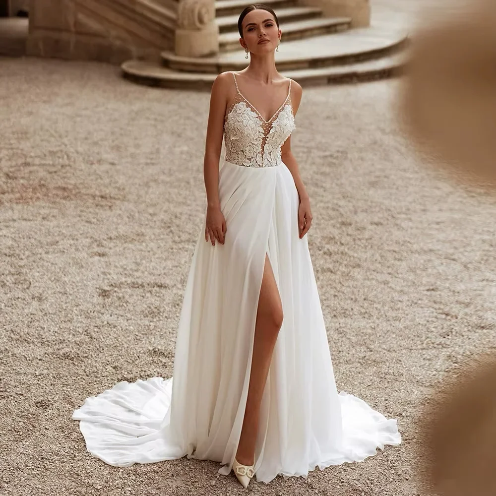 2025 Beach Wedding Dress Chiffion Split Customized Spaghetti Straps Deep V Neck Beading Pearls Applique Customize To Measures
2025 Beach Wedding Dress Chiffion Split Customized Spaghetti Straps Deep V Neck Beading Pearls Applique Customize To Measures
