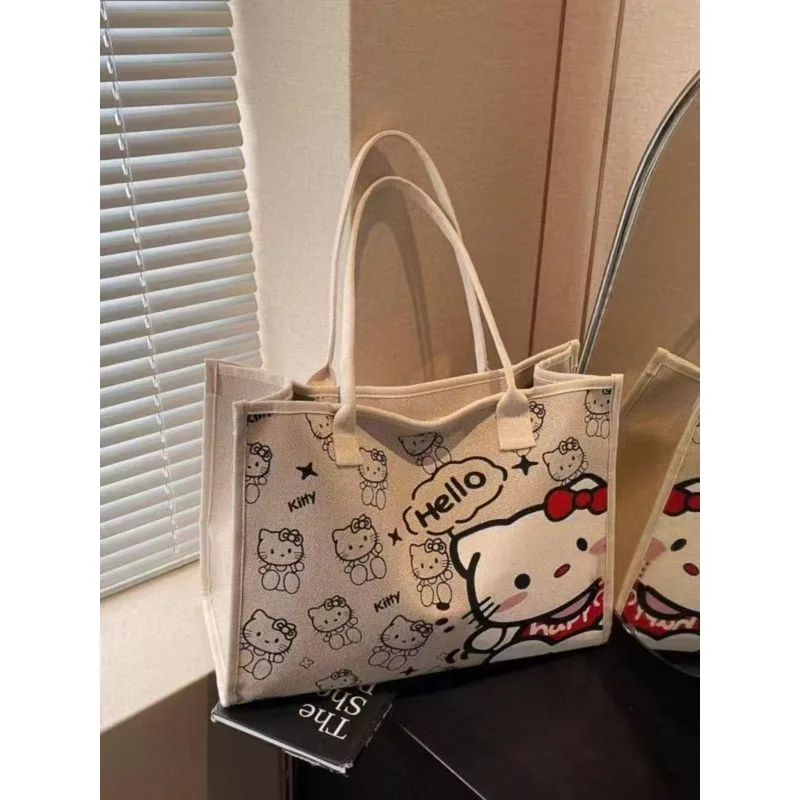 Сумка Miniso Hello Kitty, красивая мультяшная нежная холщовая сумка, вместительная студенческая универсальная модная ручная сумка для хранения
Сумка Miniso Hello Kitty, красивая мультяшная нежная холщовая сумка, вместительная студенческая универсальная модная ручная сумка для хранения