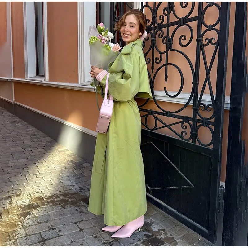 Зеленый тренч с поясом и отложным воротником, женский свободный плащ на шнуровке с пуговицами, ветровка с длинными рукавами, новинка 2026 года, весенняя женская верхняя одежда в стиле High Street
Зеленый тренч с поясом и отложным воротником, женский свободный плащ на шнуровке с пуговицами, ветровка с длинными рукавами, новинка 2026 года, весенняя женская верхняя одежда в стиле High Street