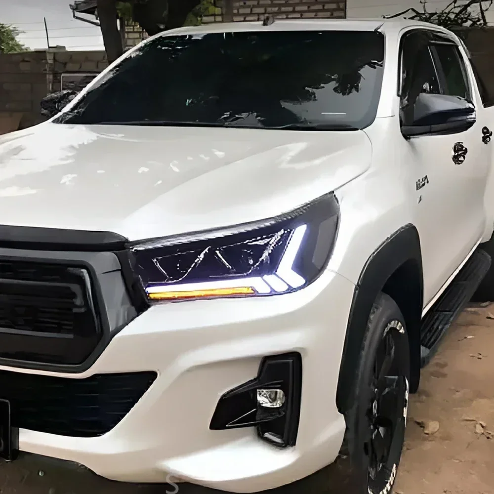 Для Toyota Hilux Revo Vigo 2015-2021 автомобильный головной фонарь обновленный проектор с двумя линзами динамический указатель поворота Лидер продаж аксессуары
Для Toyota Hilux Revo Vigo 2015-2021 автомобильный головной фонарь обновленный проектор с двумя линзами динамический указатель поворота Лидер продаж аксессуары