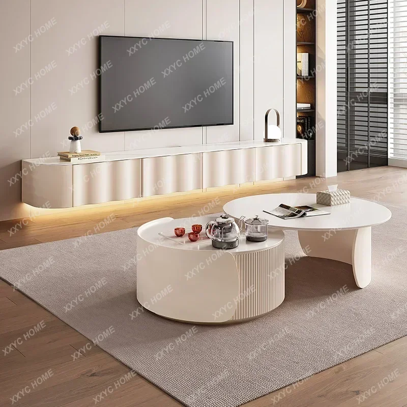LCream style coffee table combination light luxury living room household high-end rock slab round kung fu tea table
LCream style coffee table combination light luxury living room household high-end rock slab round kung fu tea table