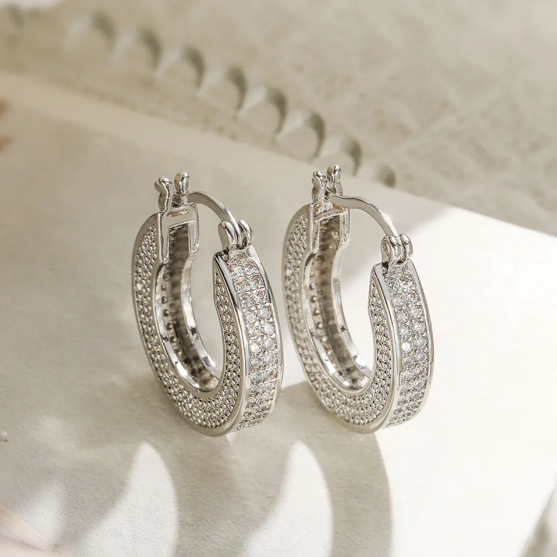 European and American Fashion Exquisite Copper Plated Real Gold Zircon Geometric Earrings for Women Niche Light Luxury High-end
European and American Fashion Exquisite Copper Plated Real Gold Zircon Geometric Earrings for Women Niche Light Luxury High-end