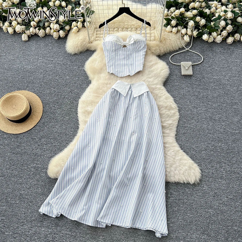 TWOTWINSTYLE Elegant Stripe Two Piece Sets For Women Camisole Sleeveless Top High Waist Long Skirt Chic Set Female New KSE540853
TWOTWINSTYLE Elegant Stripe Two Piece Sets For Women Camisole Sleeveless Top High Waist Long Skirt Chic Set Female New KSE540853
