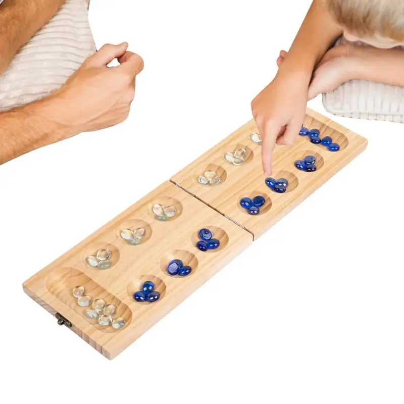 Игра Mancala для детей, складная деревянная игра Mancala, шахматный набор с 48 стеклянными бусинами, стратегические развивающие игры, многофункциональные
Игра Mancala для детей, складная деревянная игра Mancala, шахматный набор с 48 стеклянными бусинами, стратегические развивающие игры, многофункциональные