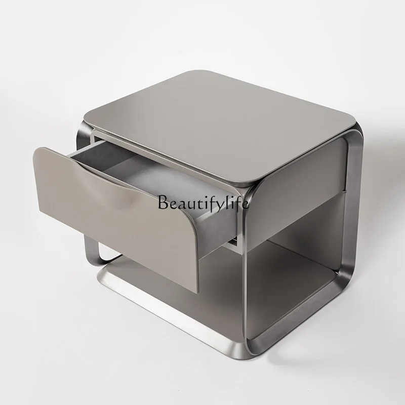 Italian minimalist modern minimalist light luxury bedside table designer solid wood bedroom storage cabinet
Italian minimalist modern minimalist light luxury bedside table designer solid wood bedroom storage cabinet