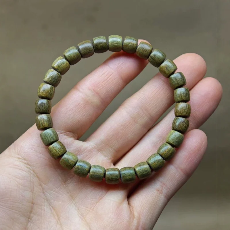 Authentic Green Buddha Bead Bracelet, Natural Black , 7x8 Straight Cut, Exquisitely Crafted Sandalwood Frag
Authentic Green Buddha Bead Bracelet, Natural Black , 7x8 Straight Cut, Exquisitely Crafted Sandalwood Frag