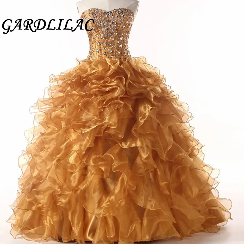 Милое платье Quinceanera, золотое бальное платье, свадебное платье для свадьбы, вечернее платье с оборками для выпускного вечера
Милое платье Quinceanera, золотое бальное платье, свадебное платье для свадьбы, вечернее платье с оборками для выпускного вечера