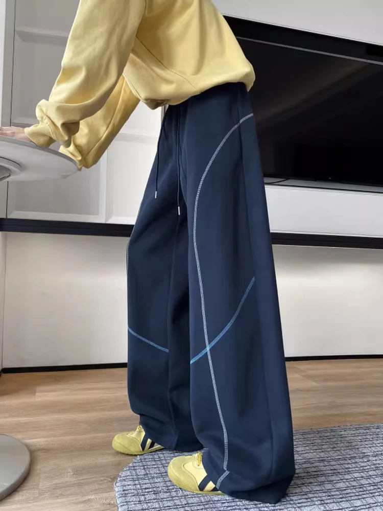 Мужские спортивные брюки свободного кроя с эффектом похудения, в американском стиле, с пэчворком, синие, повседневные, прямые, для осени и зимы
Мужские спортивные брюки свободного кроя с эффектом похудения, в американском стиле, с пэчворком, синие, повседневные, прямые, для осени и зимы