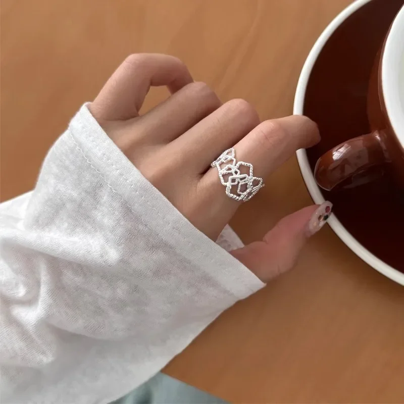 925 Sterling Silver Charming Geometric Irregular Hollow Adjustable Opening Ring for Women Fine Jewelry Minimalist Accessories
925 Sterling Silver Charming Geometric Irregular Hollow Adjustable Opening Ring for Women Fine Jewelry Minimalist Accessories