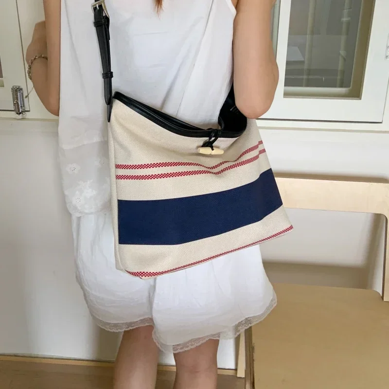 Original Vintage Square Handbag With Fashionable Look And Leather Accents Easily Functions As A Spacious Commuter Diaper Bag
Original Vintage Square Handbag With Fashionable Look And Leather Accents Easily Functions As A Spacious Commuter Diaper Bag