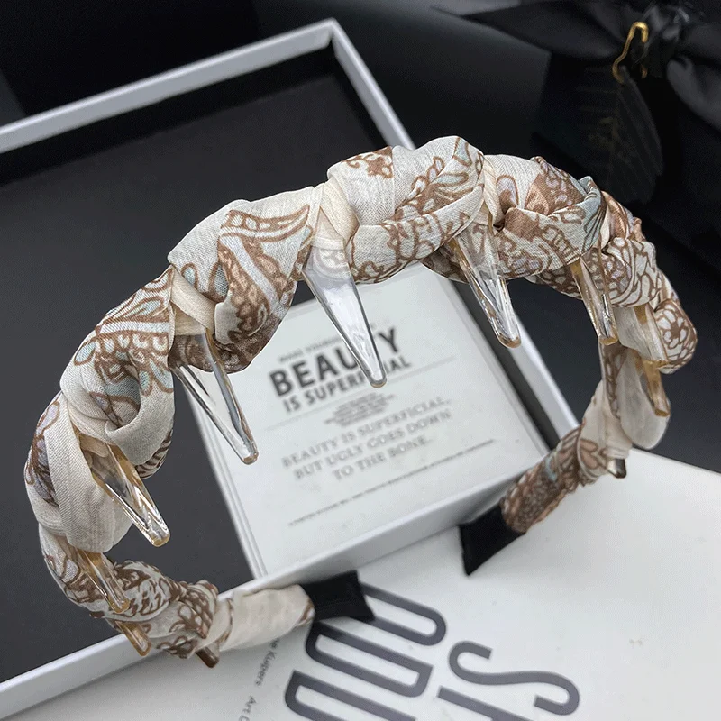 Fashionable and minimalist headband for women with narrow edges and teeth, anti slip pressure hair and wash face headband
Fashionable and minimalist headband for women with narrow edges and teeth, anti slip pressure hair and wash face headband