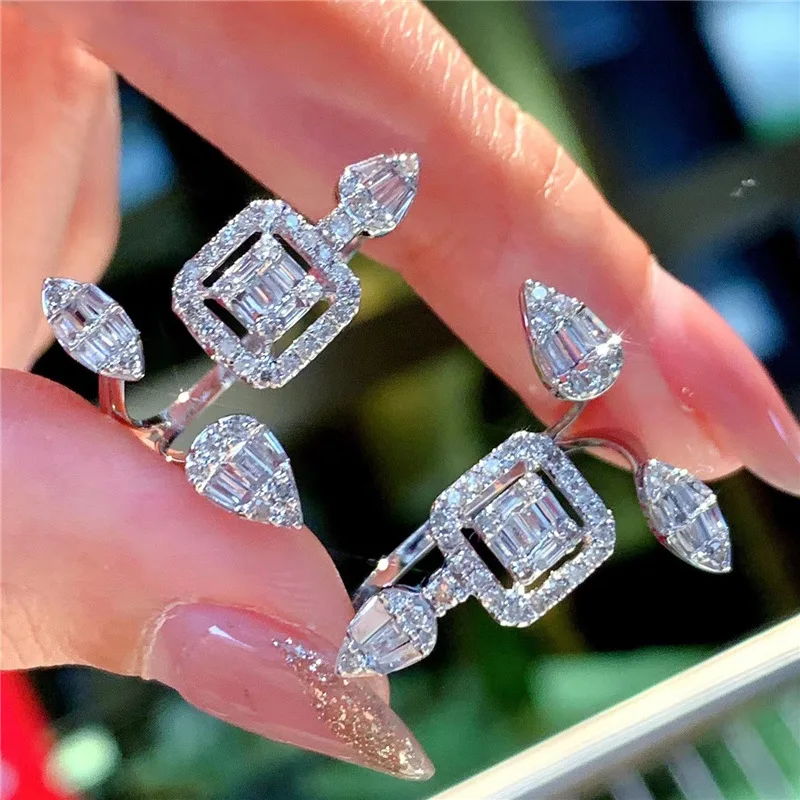 RAKOL Luxury CZ Zirconia Open Rings for Women Water Drop Square Zirconia Adjustable Ring Female Dainty Brand Jewelry
RAKOL Luxury CZ Zirconia Open Rings for Women Water Drop Square Zirconia Adjustable Ring Female Dainty Brand Jewelry