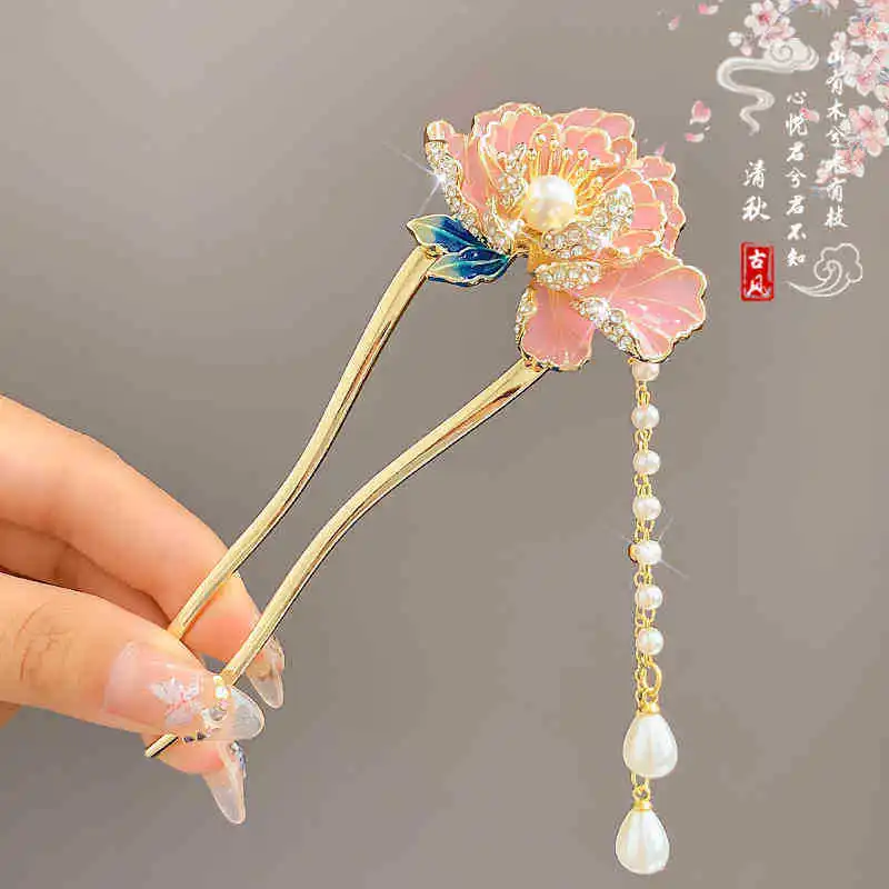 U-shaped hairpin Butterfly fringed hairpin Advanced sense antique hair reel hairpin walking pearl hairpin cheongsam shape
U-shaped hairpin Butterfly fringed hairpin Advanced sense antique hair reel hairpin walking pearl hairpin cheongsam shape