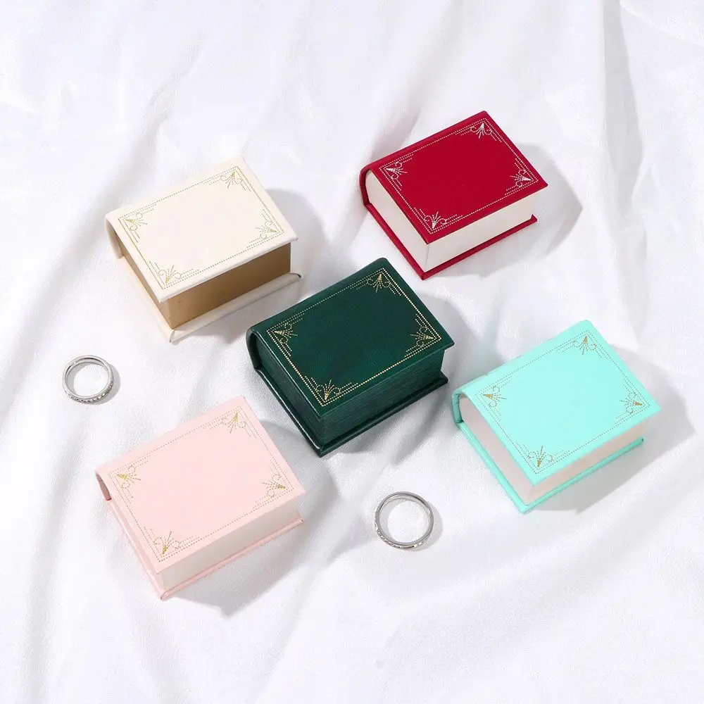 Creative PU Leather Ring Box Flip Lid Retro Ring Holder Book-shaped Jewelry Gift Storage Box
Creative PU Leather Ring Box Flip Lid Retro Ring Holder Book-shaped Jewelry Gift Storage Box