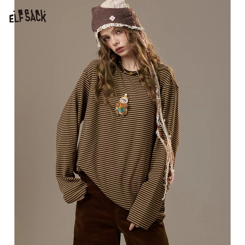 ELFSACK 2026, женская футболка с длинным рукавом, осень-зима, свободный трикотаж в желтую полоску, милый плюшевый топ в стиле ретро с нашивкой для куклы
ELFSACK 2026, женская футболка с длинным рукавом, осень-зима, свободный трикотаж в желтую полоску, милый плюшевый топ в стиле ретро с нашивкой для куклы