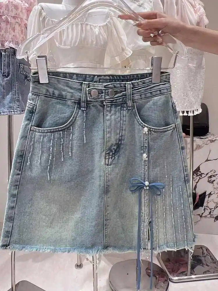 Fashion Beading Denim Short Skirts Women Summer New High Waist Slim Chic Bow Lace-up Skirts Raw Edge A-line Wrap Hip Skirts
Fashion Beading Denim Short Skirts Women Summer New High Waist Slim Chic Bow Lace-up Skirts Raw Edge A-line Wrap Hip Skirts