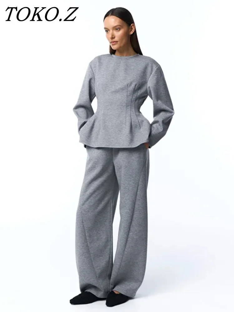 TOKO Women's Spring Summer Crew Neck Waist Defined Peplum Top Wide Leg Pants Set Casual Minimalist 2026 Trendy Fashion Set
TOKO Women's Spring Summer Crew Neck Waist Defined Peplum Top Wide Leg Pants Set Casual Minimalist 2026 Trendy Fashion Set