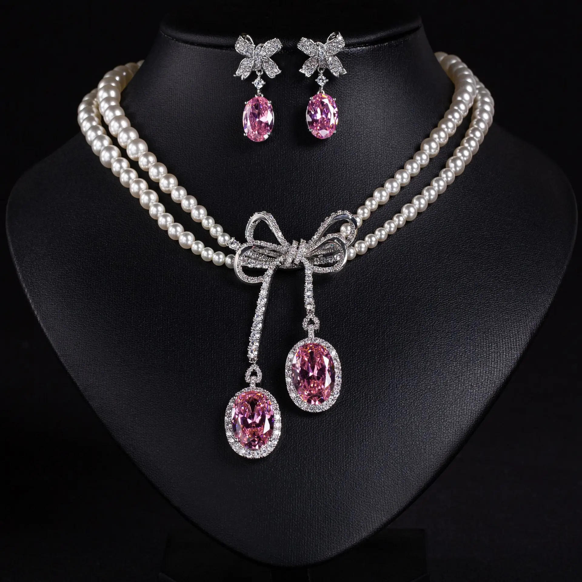 Pearl studded diamond bow necklace earrings, fashionable and luxurious design, niche collarbone chain, new personalized accessor
Pearl studded diamond bow necklace earrings, fashionable and luxurious design, niche collarbone chain, new personalized accessor