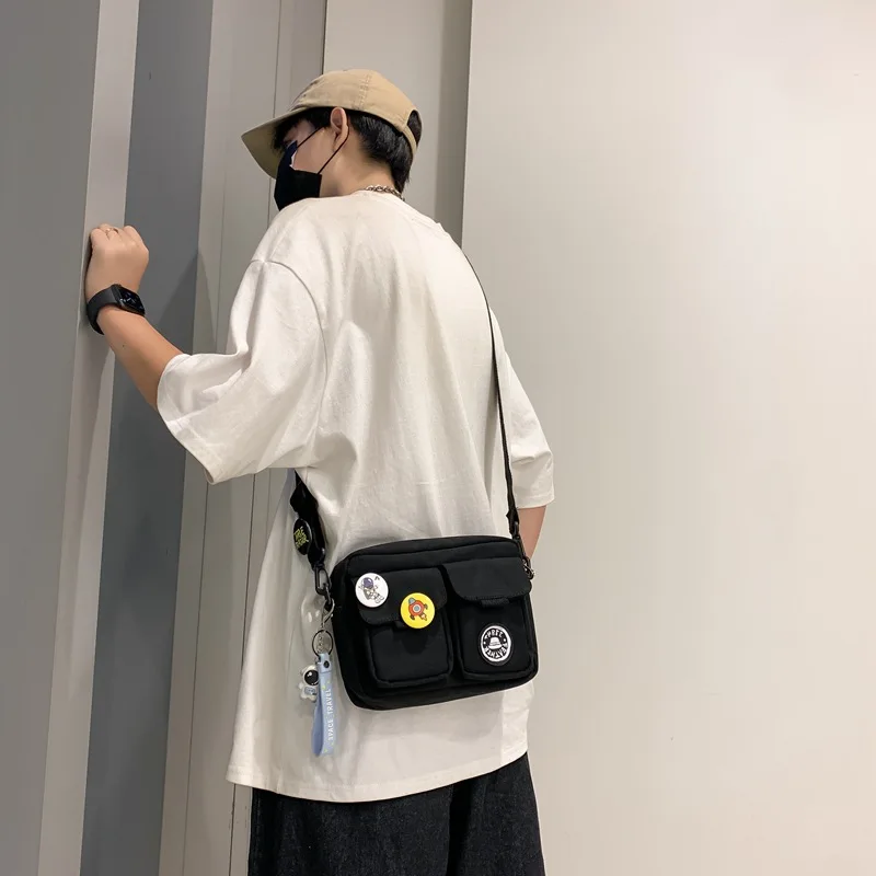 Faionable ex Мотоциклетная сумка через плечо Повседневная сумка для кампуса на одно плечо из нейлонового материала для мужчин и женщин
Faionable ex Мотоциклетная сумка через плечо Повседневная сумка для кампуса на одно плечо из нейлонового материала для мужчин и женщин