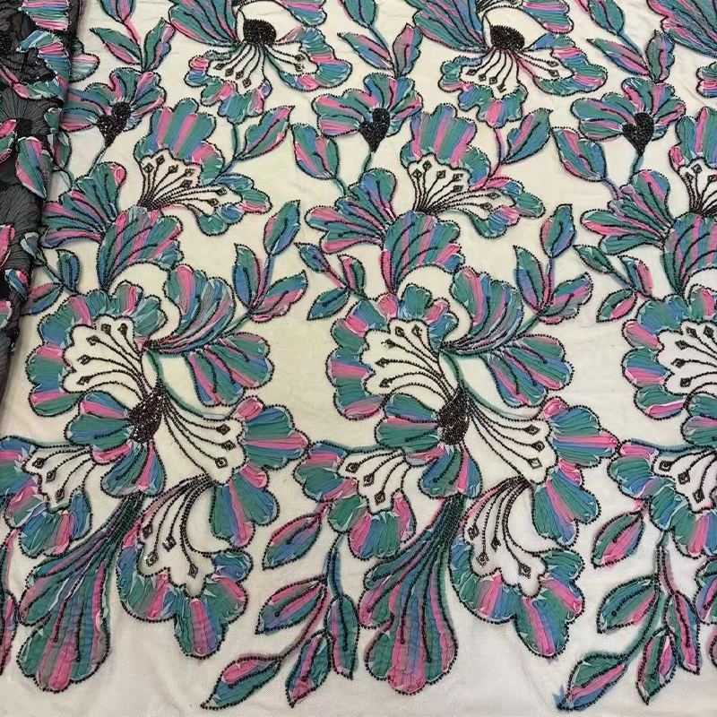 French mesh fabric, African fashion embroidery, beading, colorful plate flowers, sequins and sequins, embroidered fabric dress
French mesh fabric, African fashion embroidery, beading, colorful plate flowers, sequins and sequins, embroidered fabric dress