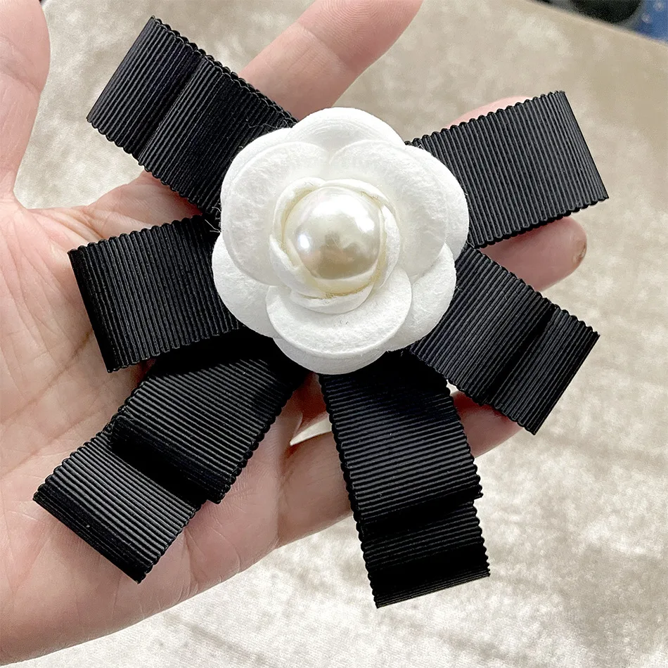 Women's Pearl Camellia Bow Tie Brooch,Girl Womens Fashion Elegant French Floral Corsage Collar Flower Shirt Pins Gifts for Women
Women's Pearl Camellia Bow Tie Brooch,Girl Womens Fashion Elegant French Floral Corsage Collar Flower Shirt Pins Gifts for Women