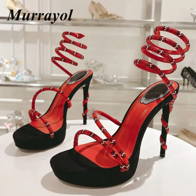 Сандалии на щиколотке, женская обувь в форме змеи, декоративные сандалии на тонком высоком каблуке со стразами, летние модельные туфли для банкета
Сандалии на щиколотке, женская обувь в форме змеи, декоративные сандалии на тонком высоком каблуке со стразами, летние модельные туфли для банкета