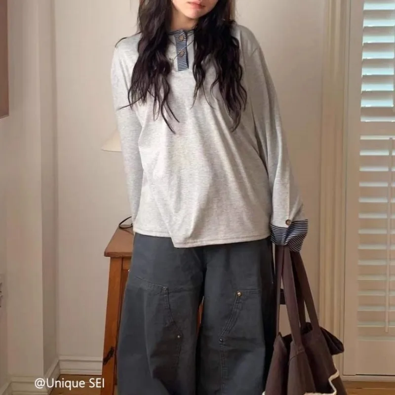 Vintage O-neck Buttons Casual Striped Long-sleeved T-shirt Women 2025 Autumn New Korean Style Contrast Color Patchwork Tops
Vintage O-neck Buttons Casual Striped Long-sleeved T-shirt Women 2025 Autumn New Korean Style Contrast Color Patchwork Tops