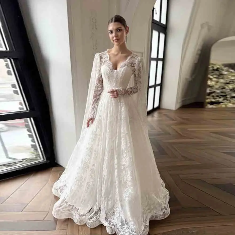 Customized Elegant Lace Wedding Dress with Cape Sleeve V Neck Full Sleeve Bridal Gown Button Detail A Line Muslim Wedding Dress
Customized Elegant Lace Wedding Dress with Cape Sleeve V Neck Full Sleeve Bridal Gown Button Detail A Line Muslim Wedding Dress