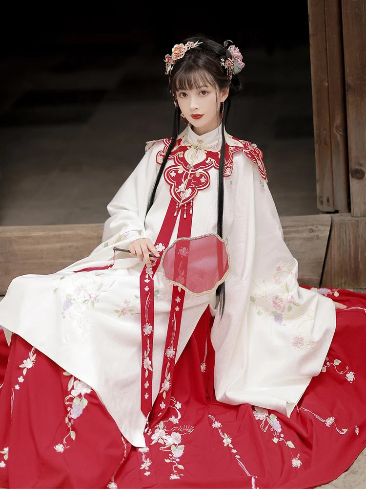 JINXIHANFU Women Han Chinese Clothing Embroidery Cloud Shoulder Stand Collar Long Shirt Ming Hanfu Dress
JINXIHANFU Women Han Chinese Clothing Embroidery Cloud Shoulder Stand Collar Long Shirt Ming Hanfu Dress