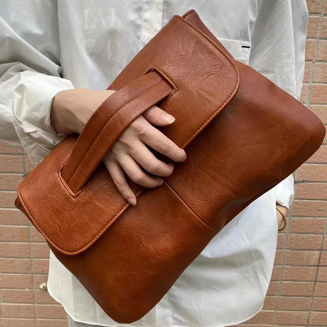 Design Clutch Bag Cover style handbag high-capacity women's file bag versatile handbag personalized casual large handbag
Design Clutch Bag Cover style handbag high-capacity women's file bag versatile handbag personalized casual large handbag