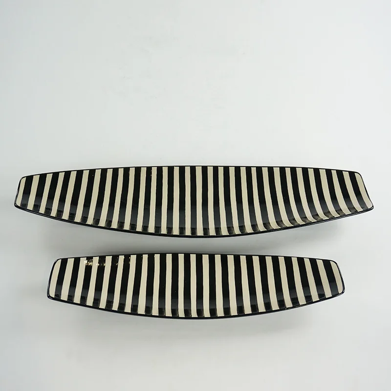 Modern simple home black and white striped long plate new Chinese model room long fruit plate dried fruit storage plate decorati
Modern simple home black and white striped long plate new Chinese model room long fruit plate dried fruit storage plate decorati