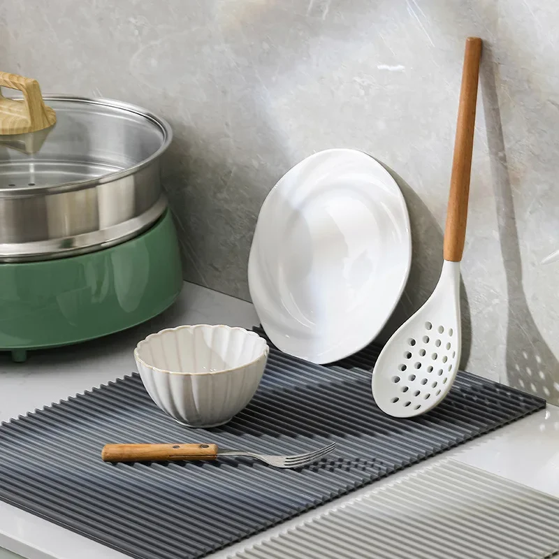 Silicone insulation mat, kitchen countertop drain mat, household pot mat, bowl and plate bar mat, household dining table mat, cu
Silicone insulation mat, kitchen countertop drain mat, household pot mat, bowl and plate bar mat, household dining table mat, cu