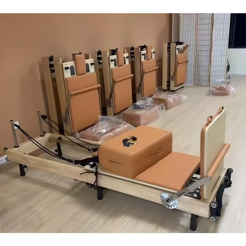 Professional factory sales fitness machine custom rice color commercial wood reformer Pilates bed foldable
Professional factory sales fitness machine custom rice color commercial wood reformer Pilates bed foldable
