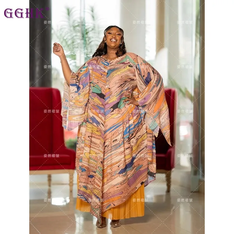 Женская элегантная длинная блузка с винтажным принтом и плиссированными деталями в сочетании с широкими брюками большого размера 
Женская элегантная длинная блузка с винтажным принтом и плиссированными деталями в сочетании с широкими брюками большого размера