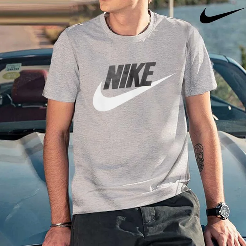 Nike Men's Grey Short Sleeve T-Shirt with White Swoosh Logo AR5005-063
Nike Men's Grey Short Sleeve T-Shirt with White Swoosh Logo AR5005-063