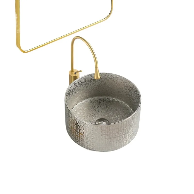 Nordic ceramic table wash basin hotel engineering bathroom wash basin sink
Nordic ceramic table wash basin hotel engineering bathroom wash basin sink