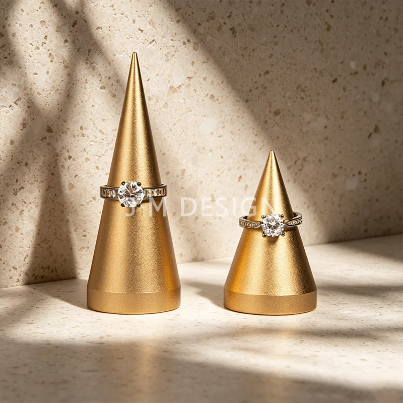 2Pcs/lot Gold Cone Ring Display Stand Solid Metal Organizer Assorted Rings Decor Accessory for Jewelry Shop Counter Exhibition
2Pcs/lot Gold Cone Ring Display Stand Solid Metal Organizer Assorted Rings Decor Accessory for Jewelry Shop Counter Exhibition