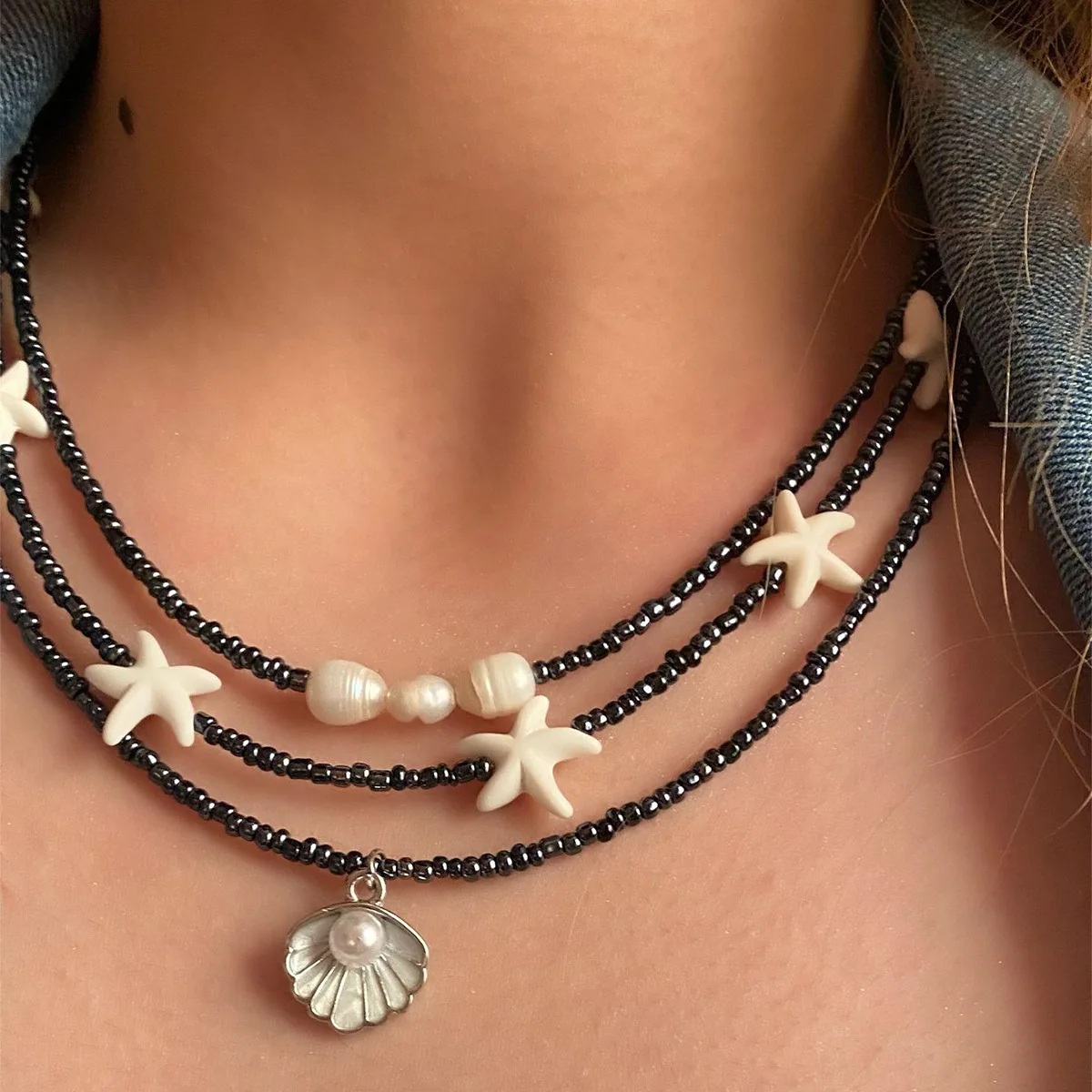 2025 summer shell pearl necklace female niche design sense black rice beads bohemian starfish collarbone chain
2025 summer shell pearl necklace female niche design sense black rice beads bohemian starfish collarbone chain