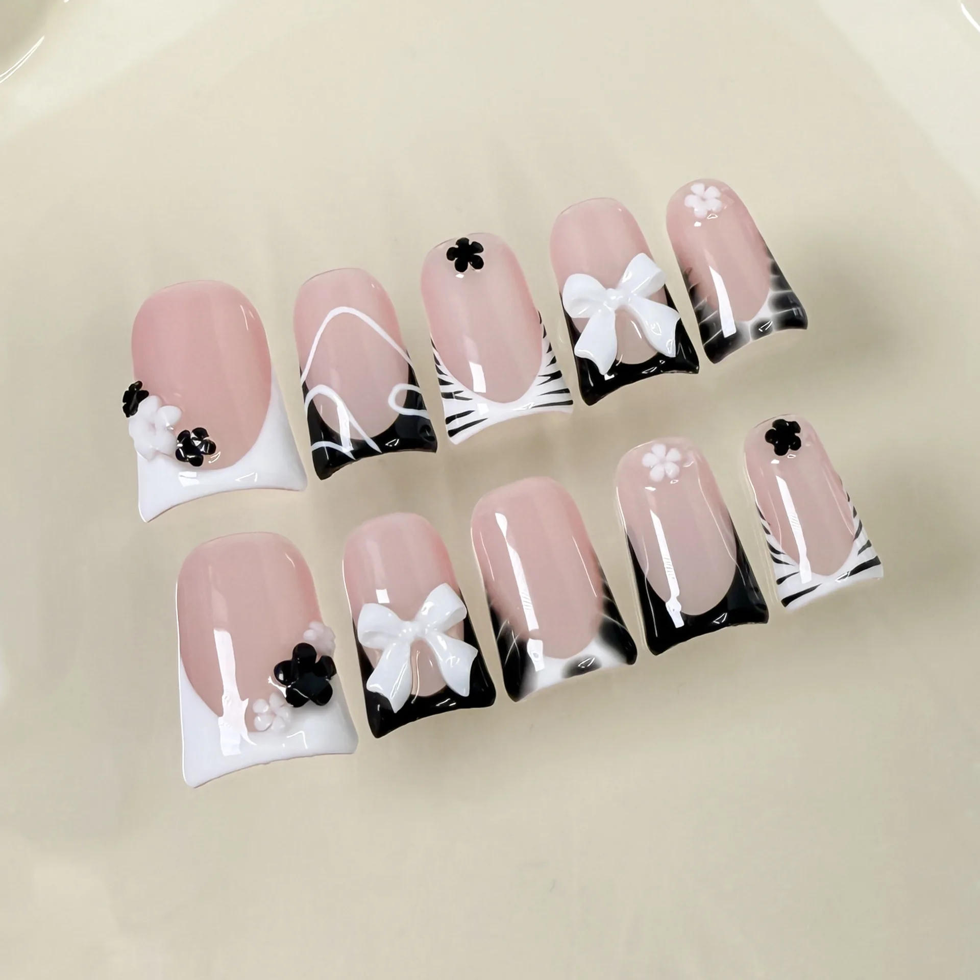 10pcs Y2k Bowknots Press On Nails Handmade Black White Duckbill False Nails Zebra Stripes French Flower Sweet Cool Fake Nail
10pcs Y2k Bowknots Press On Nails Handmade Black White Duckbill False Nails Zebra Stripes French Flower Sweet Cool Fake Nail