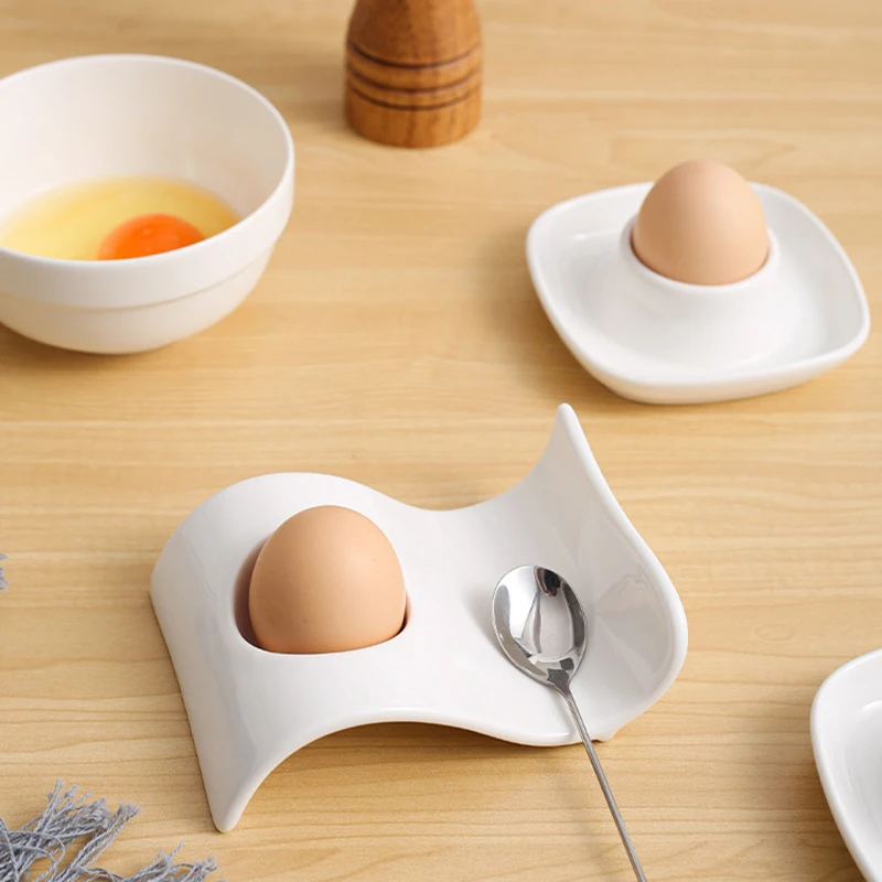 European Ceramic Egg Tray Holder Household Kitchen Breakfast Egg Cup Solid Color Soft Boiled Eggs Hotel Kitchenware
European Ceramic Egg Tray Holder Household Kitchen Breakfast Egg Cup Solid Color Soft Boiled Eggs Hotel Kitchenware
