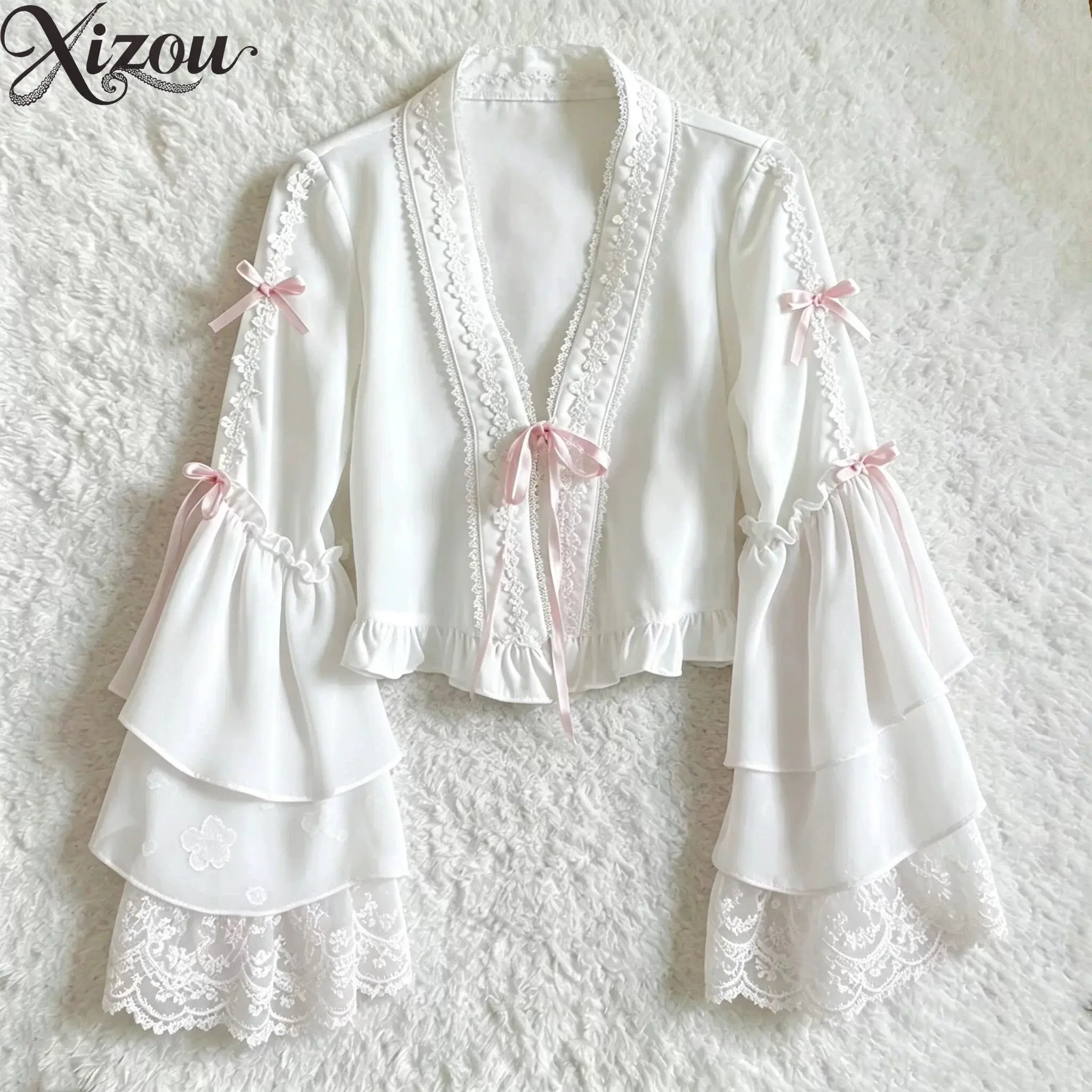 Summer Japanese Lolita White Chiffon Blouse Ruffled Sleeves Pink Bow Spring V-Neck Sweet Inner Wear 2026 Blouses Chinese Lace
Summer Japanese Lolita White Chiffon Blouse Ruffled Sleeves Pink Bow Spring V-Neck Sweet Inner Wear 2026 Blouses Chinese Lace