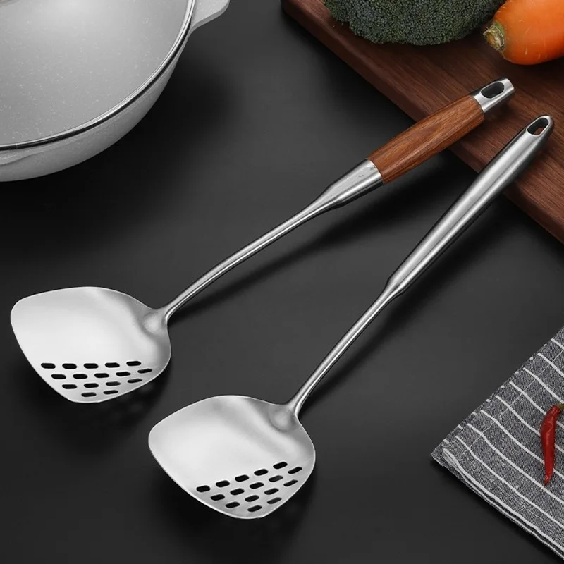 1pcs 304 Stainless Steel Perforated Spatula with Thick Wooden Handle Durable Kitchen Cooking Tool Safe Material
1pcs 304 Stainless Steel Perforated Spatula with Thick Wooden Handle Durable Kitchen Cooking Tool Safe Material