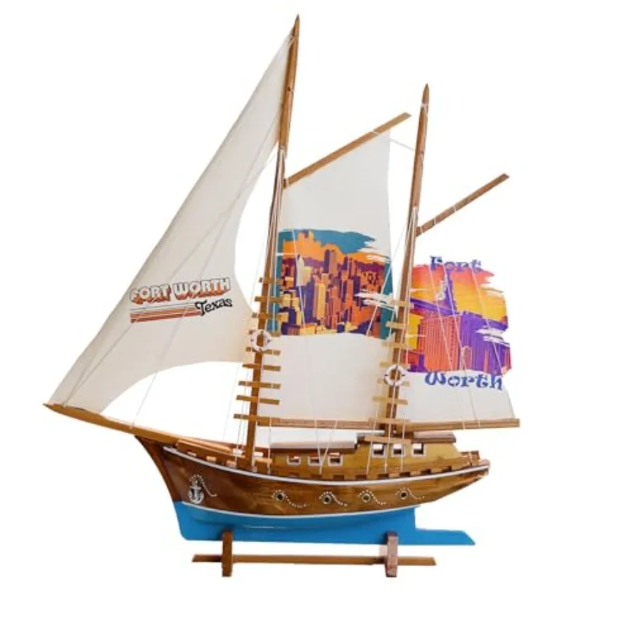 Handmade sailing yacht model for nautical home decor and gifts, crafted from printed fabric and wood, navy blue with white acce
Handmade sailing yacht model for nautical home decor and gifts, crafted from printed fabric and wood, navy blue with white acce