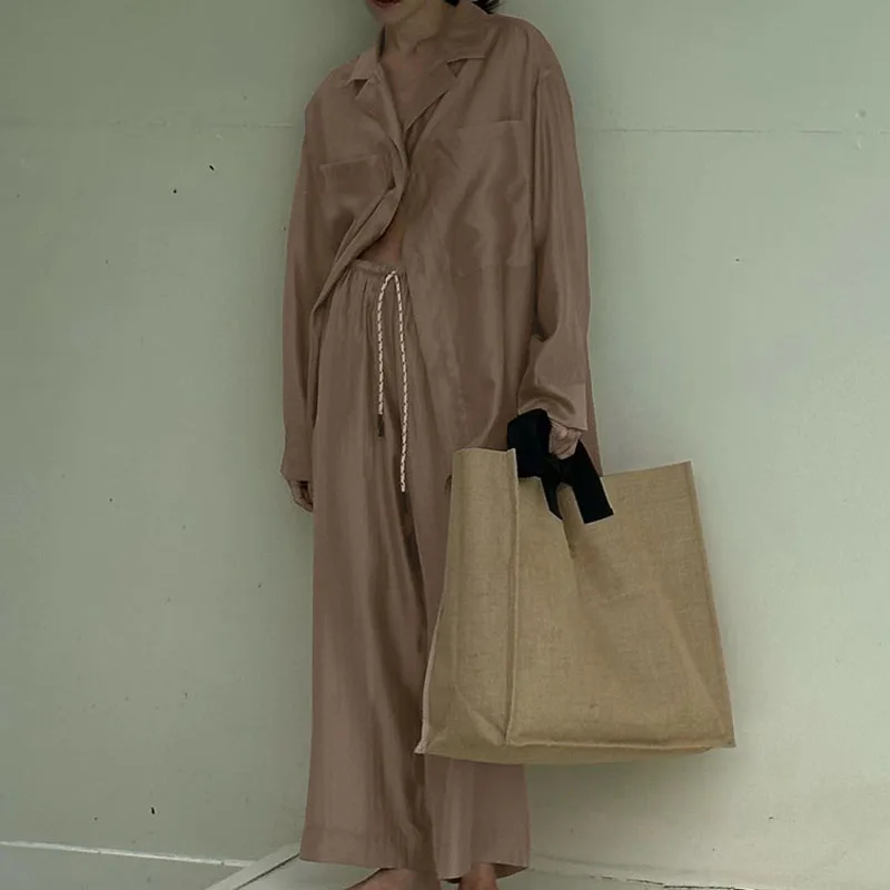 Новинка осени 2025 года, женский костюм-рубашка с лацканами, кардиган с длинными рукавами, топ, широкие брюки, комплект из двух предметов для поездок на работу 
Новинка осени 2025 года, женский костюм-рубашка с лацканами, кардиган с длинными рукавами, топ, широкие брюки, комплект из двух предметов для поездок на работу